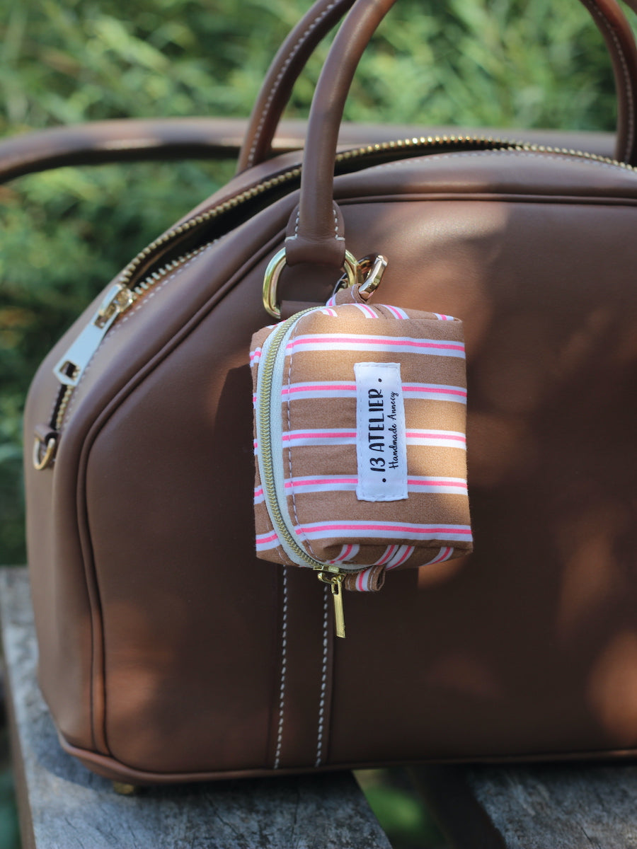 Mini trousse écouteurs rayures roses et marron
