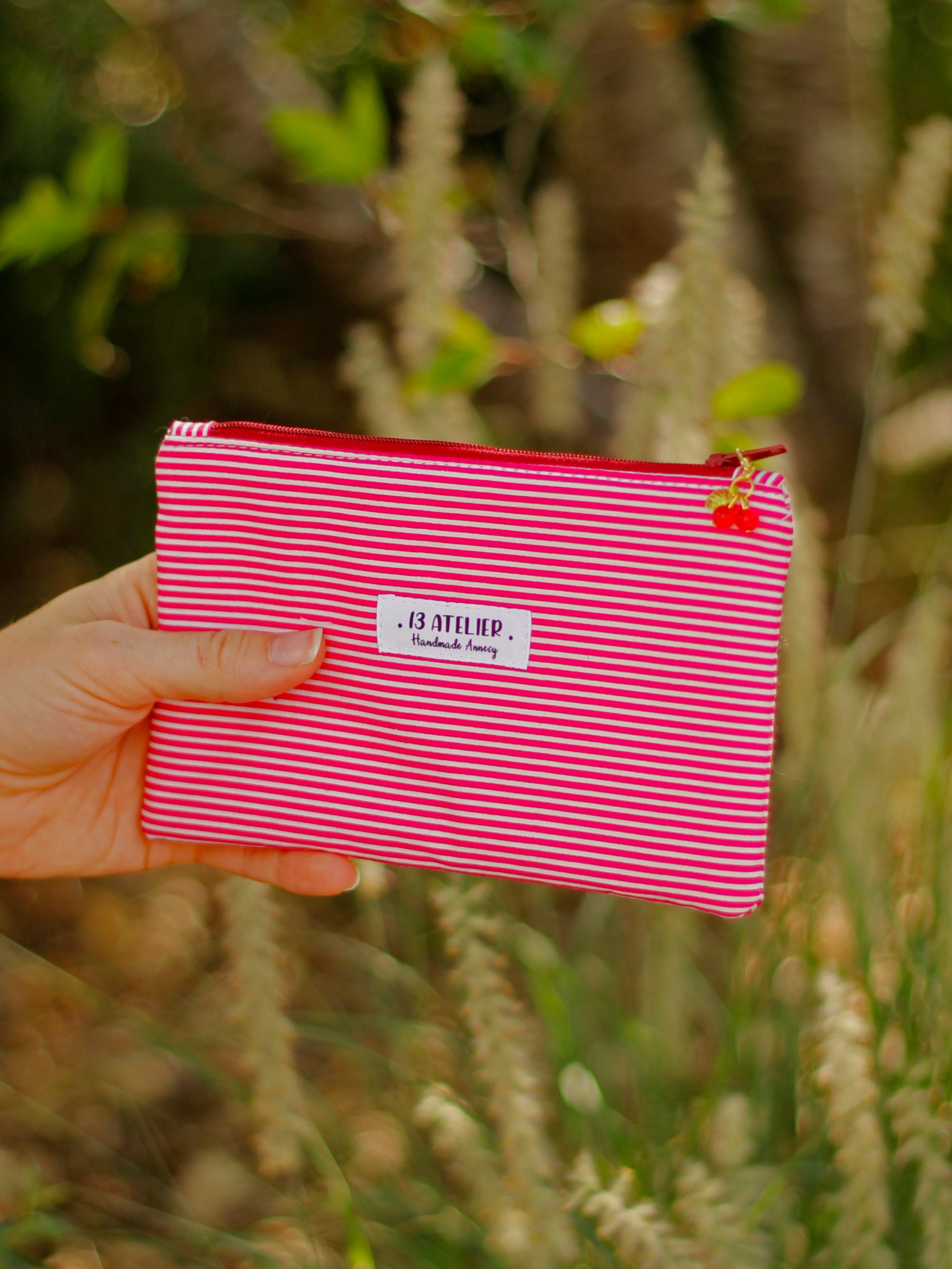 Mini pochette rayures rouges