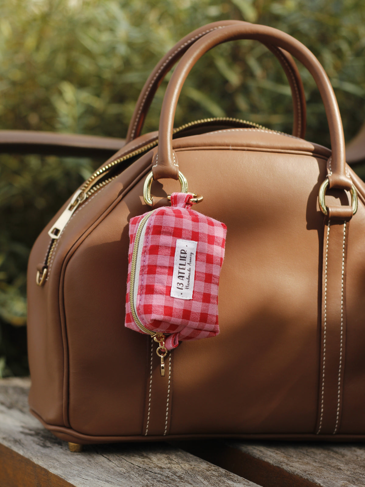 Mini trousse écouteurs vichy rose/rouge